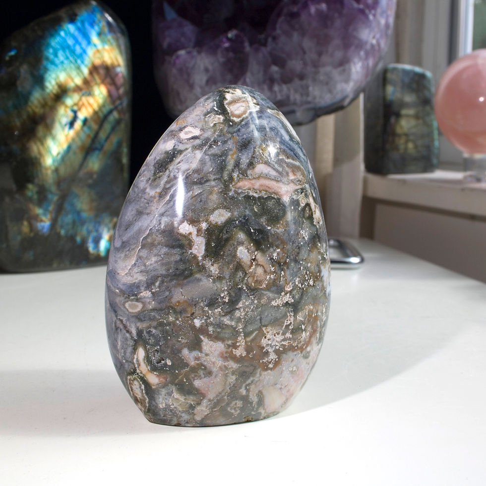 Thumbnail: A super cool Grey & Pink Ocean Jasper free form. Only found in a handful of deposits in northwestern Madagascar Ocean Jasper