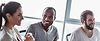 young-professional-team-discussing-business-plan-i-2022-02-02-21-53-56-utc-scaled-e1657877