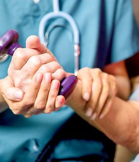 Healthcare professional assisting patient