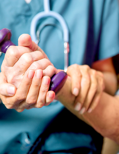 Healthcare professional assisting patient