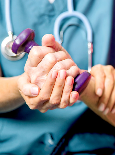 Healthcare professional assisting patient