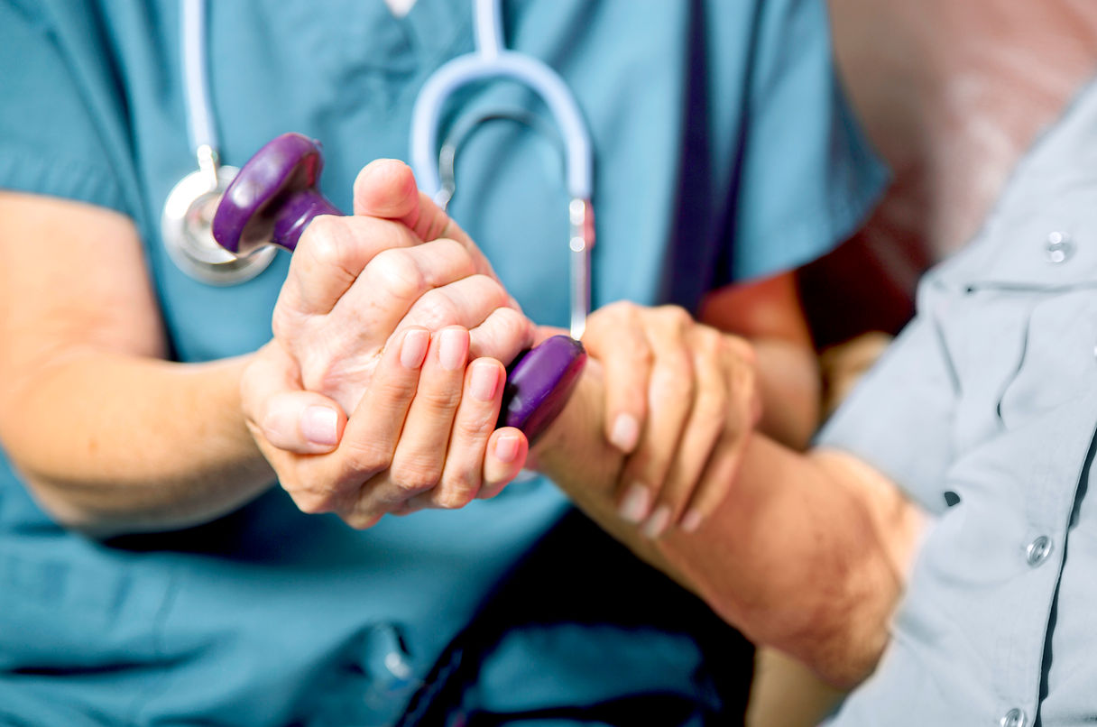 Healthcare professional assisting patient