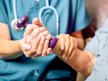 Healthcare professional assisting patient