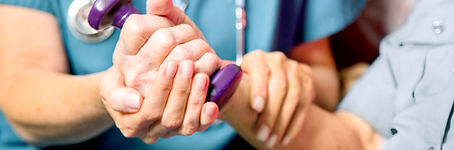 Healthcare professional assisting patient