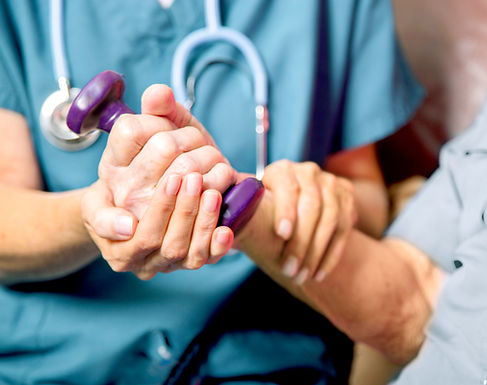 Home Nurse Examining Patient