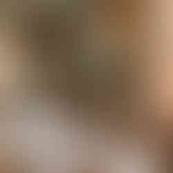 raised flower plinths on round tables at Somerley House