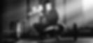 black-white-photo-muscular-build-man-using-sports-chalk-while-before-lifting-barbell-weigh