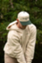 Decorative photo of a golfer wearing a Loma Club hat