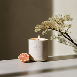 A scented candle in a stone vessel