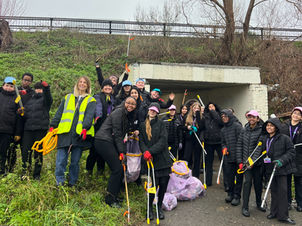 Lots of community members litter picking