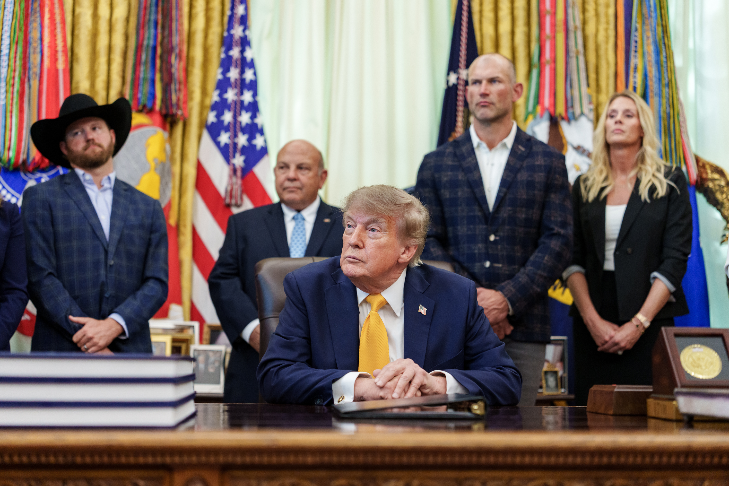 US President Donald Trump signing executive orders in the Oval Office in September 2026