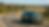 Green SUV with learner plates on a winding rural road