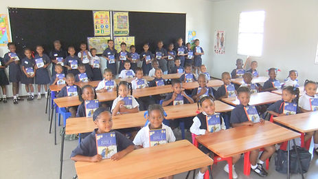 Children showing their Children's Bibles