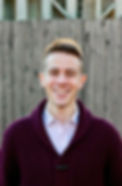 headshot of Dr. Riley Shea, owner of Pride In Movement Physical Therapy