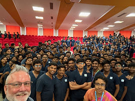 Jason Blackard, PhD, with medical students and faculty at Madha Medical College and Research Institute