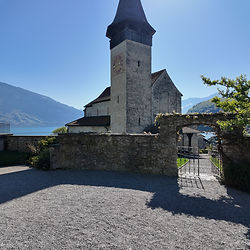 Stone church with steeple on the Bonstetten Coffee Tour.