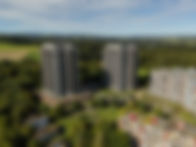 Zwei hohe Wohntürme inmitten grüner Bäume, betreutes Wohnen Bern, schöne Landschaft.