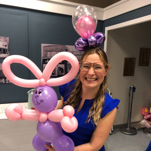 West Haven balloon man makes balloon bunny for woman