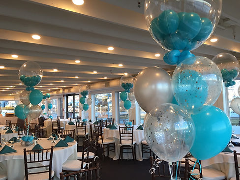 teal blue gum ball balloon arrangement for table
