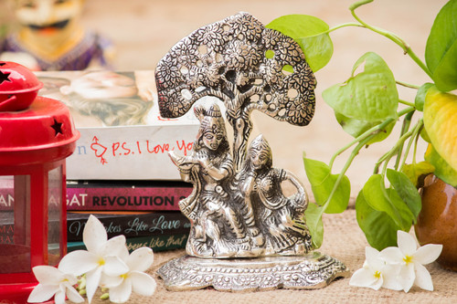 Sitting Radha Krishna Under Tree Pooja Article - Buy at Wholesale Price