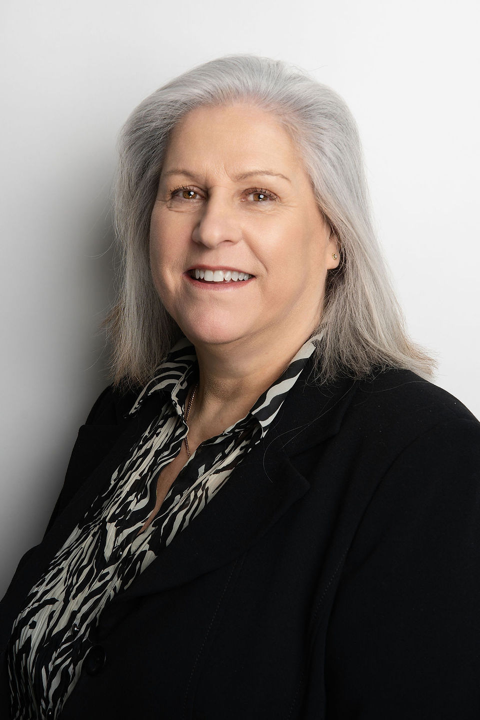 A person with long blonde hair in photoshoot with Amsterdam headshot photographer