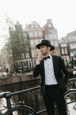 Groom photo on the bridge in Amsterdam
