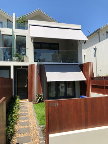 Alpha pivot arm awning by Hunter Douglas