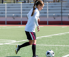 teenage girls football training white black pink.jpg