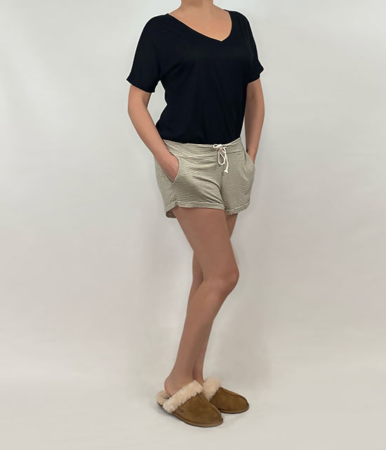 model wearing the lounge drawstring striped shorts in tan grey