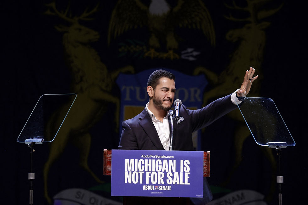 Abdul El-Sayed celebrates after his victory for the Democratic Senate bid.