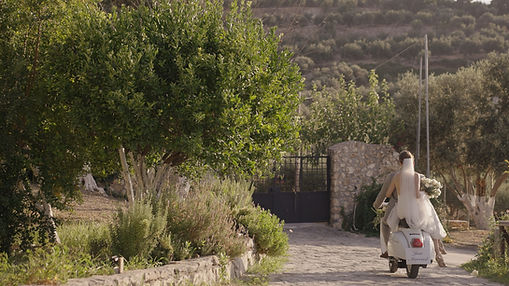 wedding photo in a vespa in Agreco farms in Crete