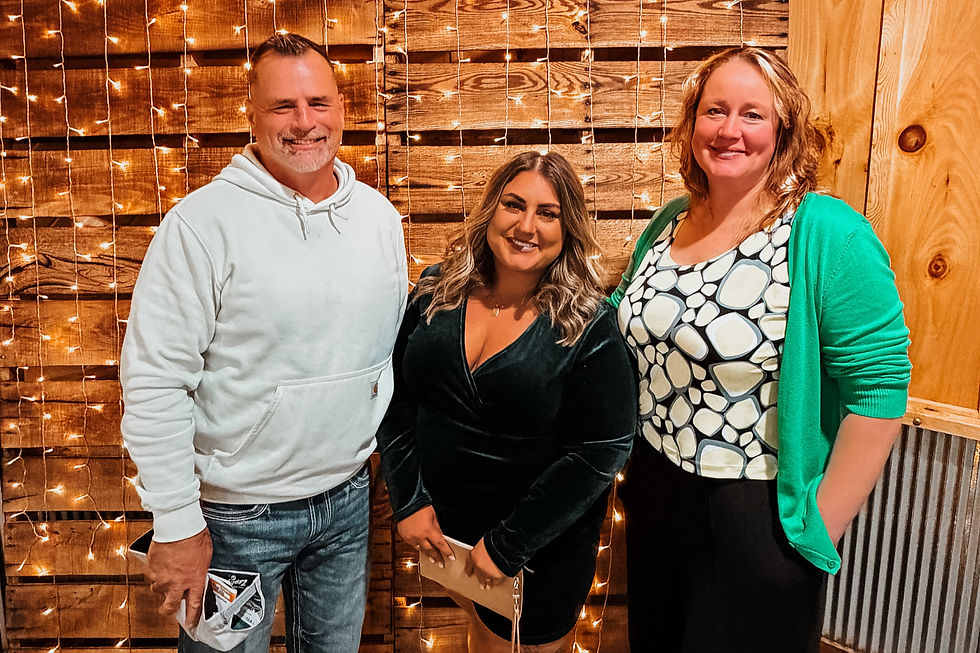 Pictured left to right: HCCC President Statton Clark, Board Member Jenna Gelow, and Executive Director Jaclynn Graybill.