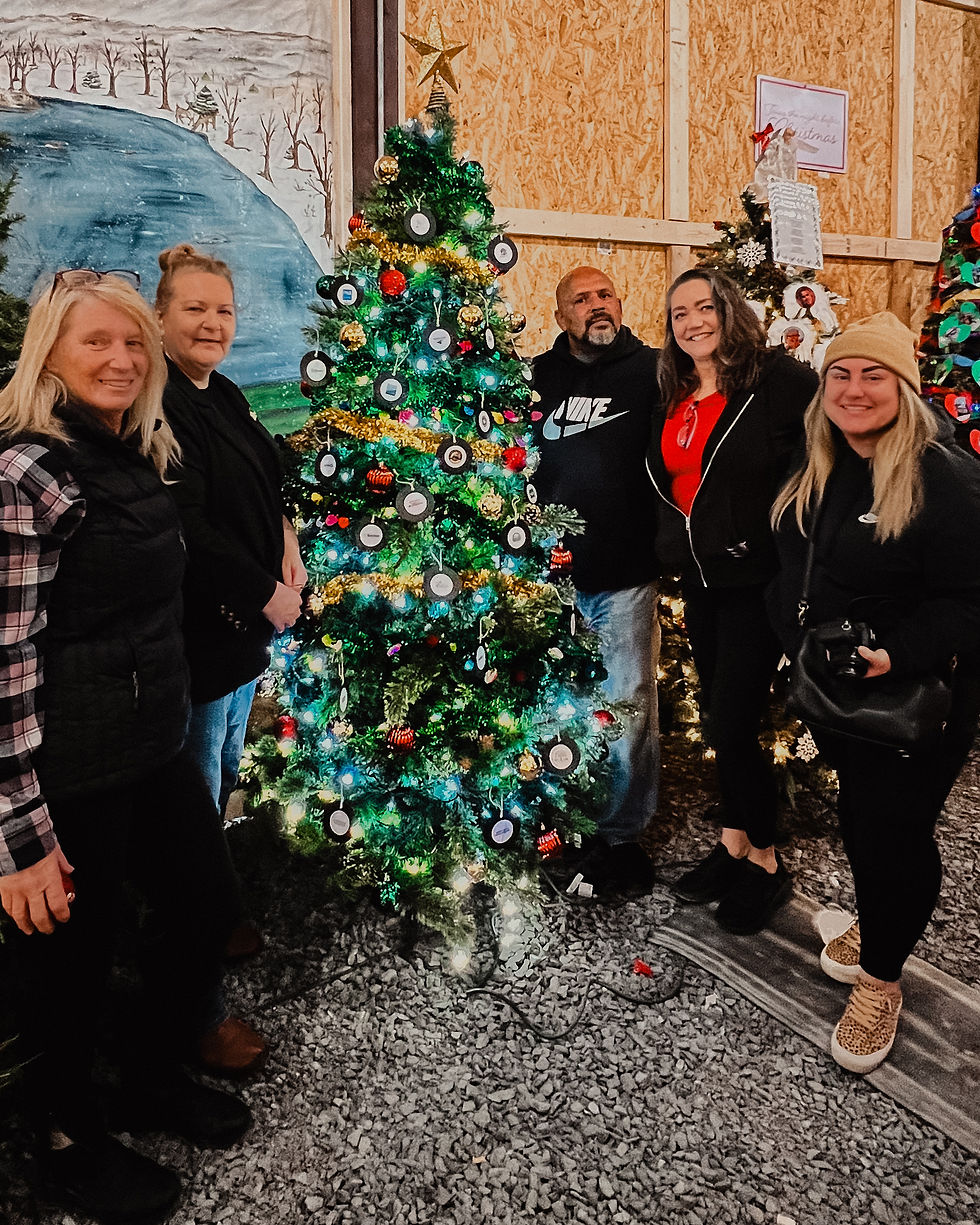 Jodi Adams, Cathy Simon, Lee Ann Wiiki & her husband, and Jenna Gelow—thank you for decorating our HCCC tree!