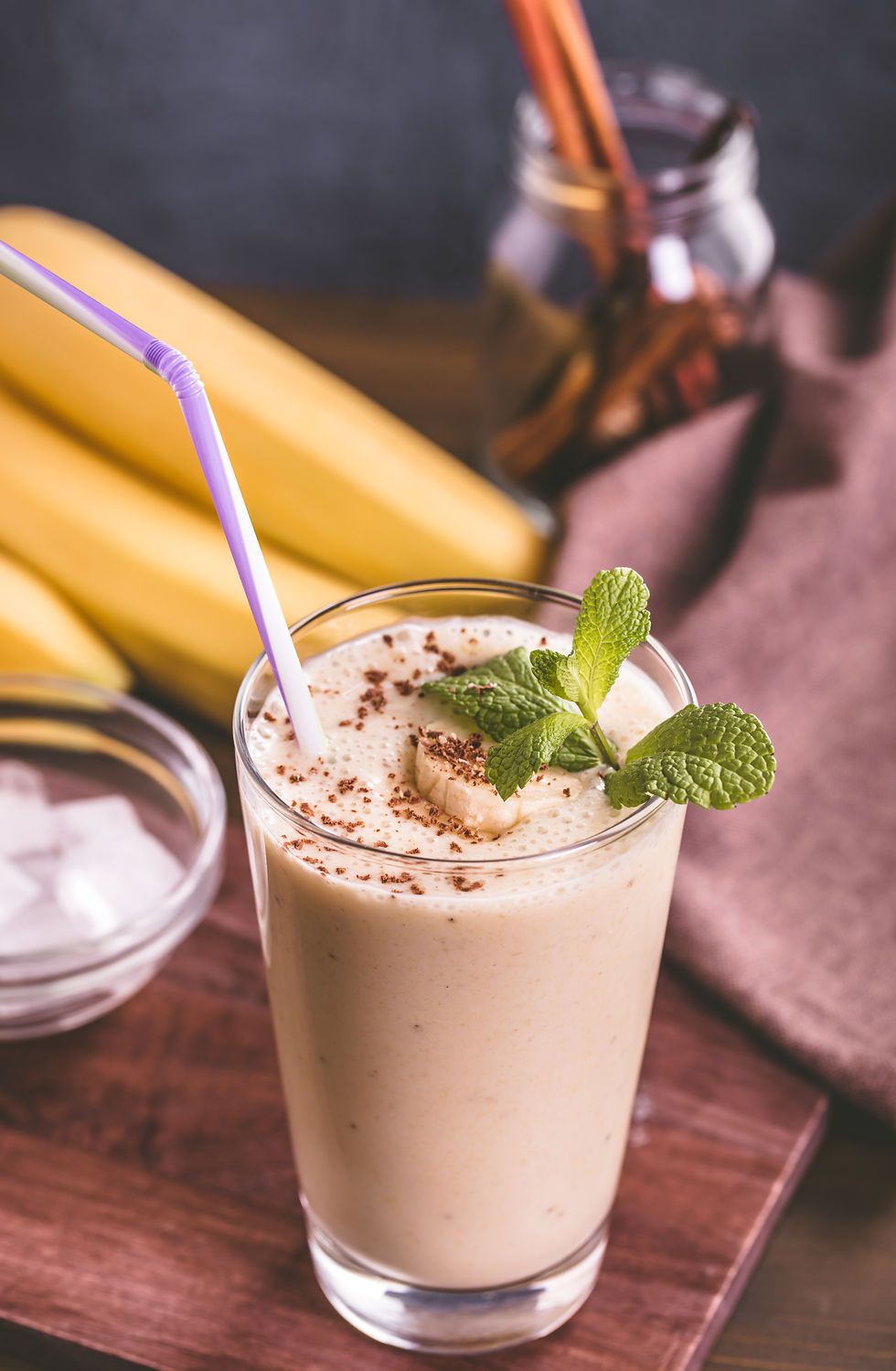 banana-smoothie-on-wooden-table-PUTNBLM.