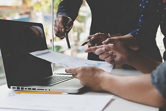 069439849-people-working-document-and-la