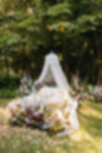 Luxury Fairytale Elopement with vintage bed surrounded by flowers