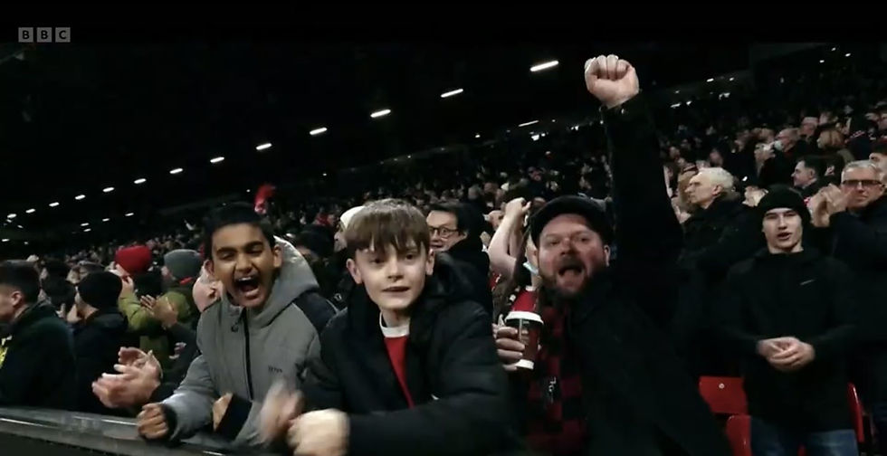 Man United fans celebrating at Old Trafford