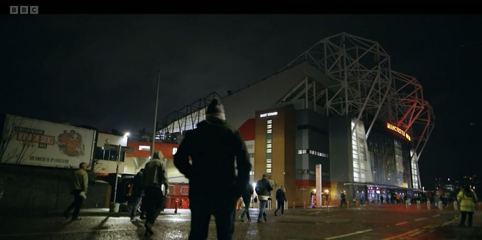 A photo of football fans walking towards Old Trafford for Man Utd's FA Cup clash against Aston Villa.