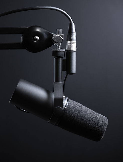 Black%20podcasting%20microphone%20on%20arm.%20Please%20consider%20crediting%20%22Image%3A%20Jukka%20