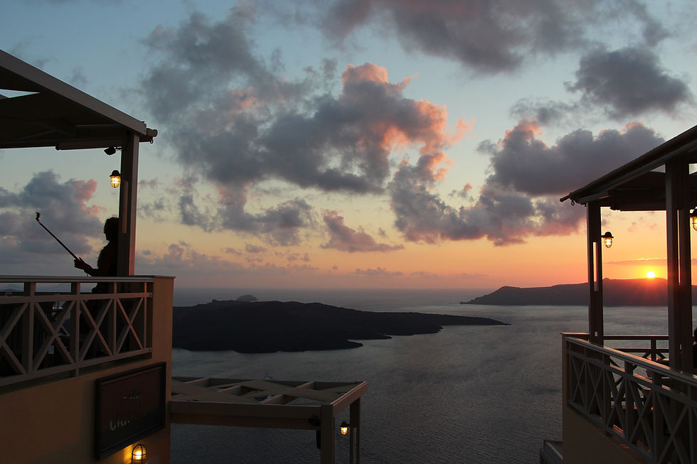 sunset in fira santorini greece,