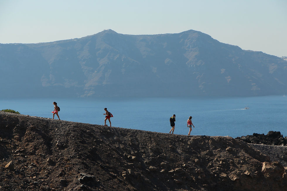 hiking the caldera in the agean sea of santorini, greece