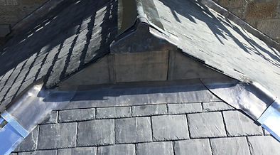 Slate roofing with hip and ridge details 