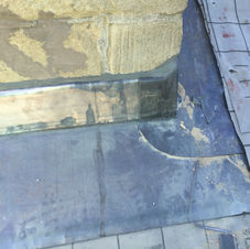 Lead flashing detail on chimney apron and cover flashing