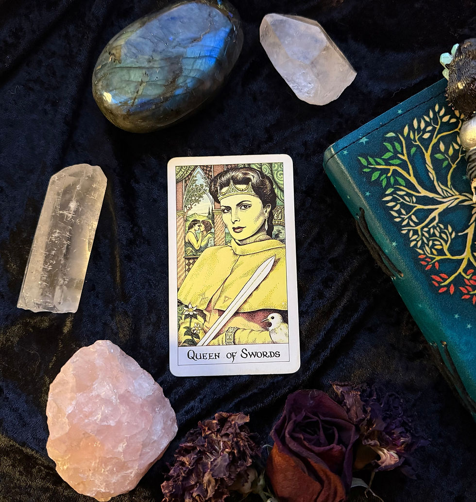 The Queen of Swords from the Cosmic Tarot Deck.