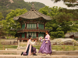 Surprise Proposal Photoshoot wearing Hanbok at Gyeongbok Palace | Seoul Photographer