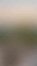 שולחן בבר-מסעדה Secret Mountain עם שקיעה מעל ההרים