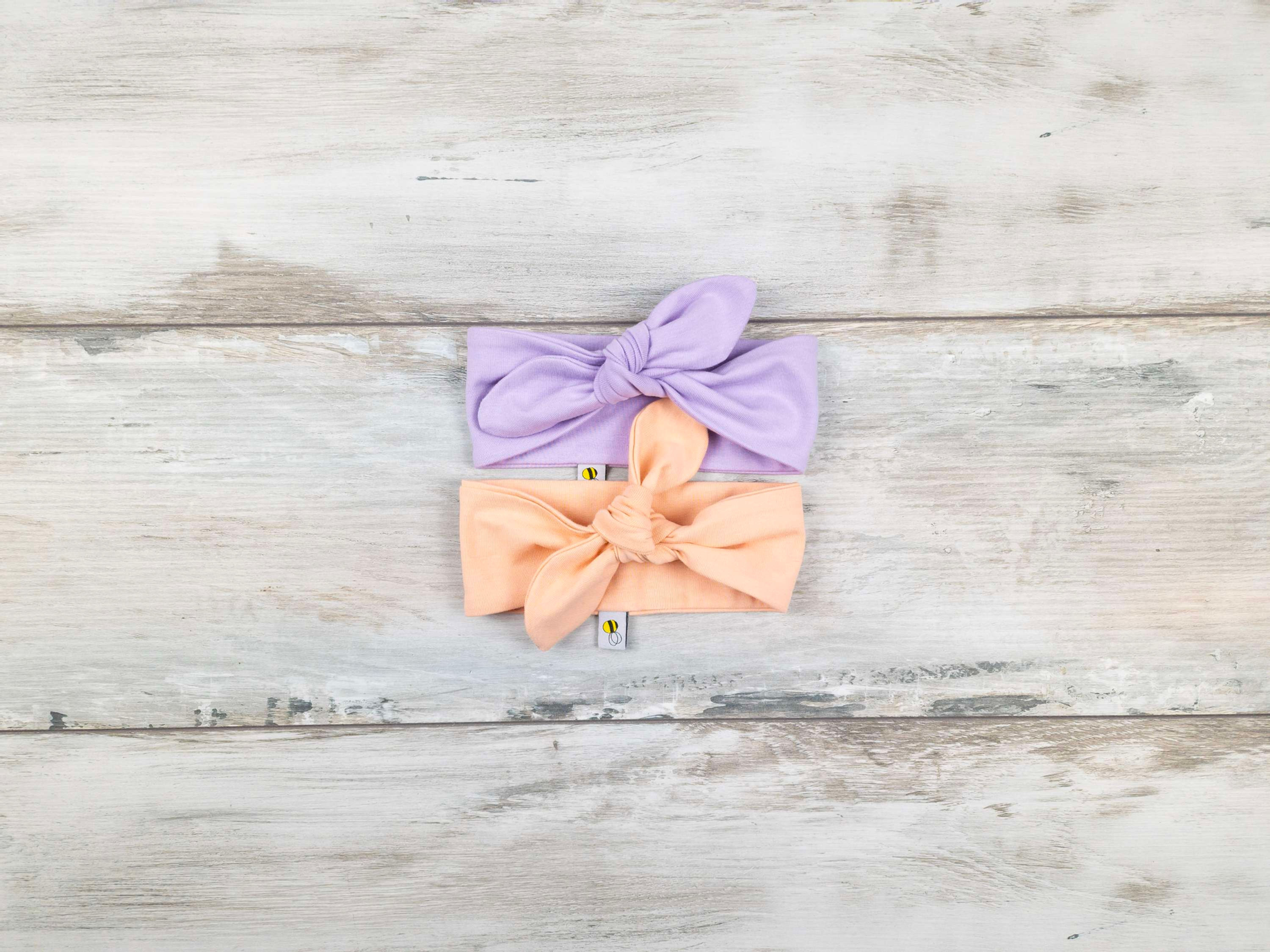 Violets un persiku krāsas matu lentu komplekts