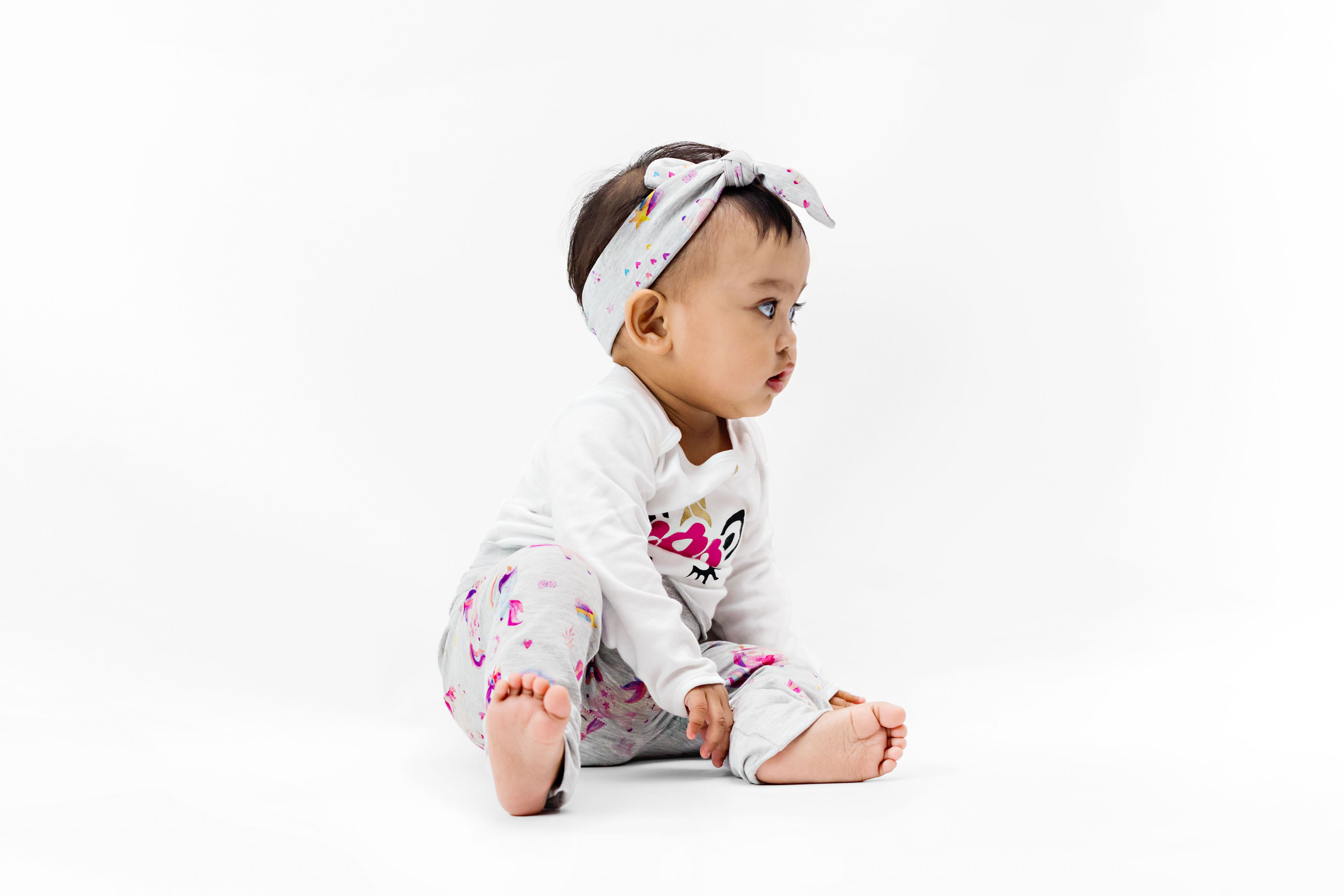 Pants, bodysuit and headband or hat set with unicorn pattern