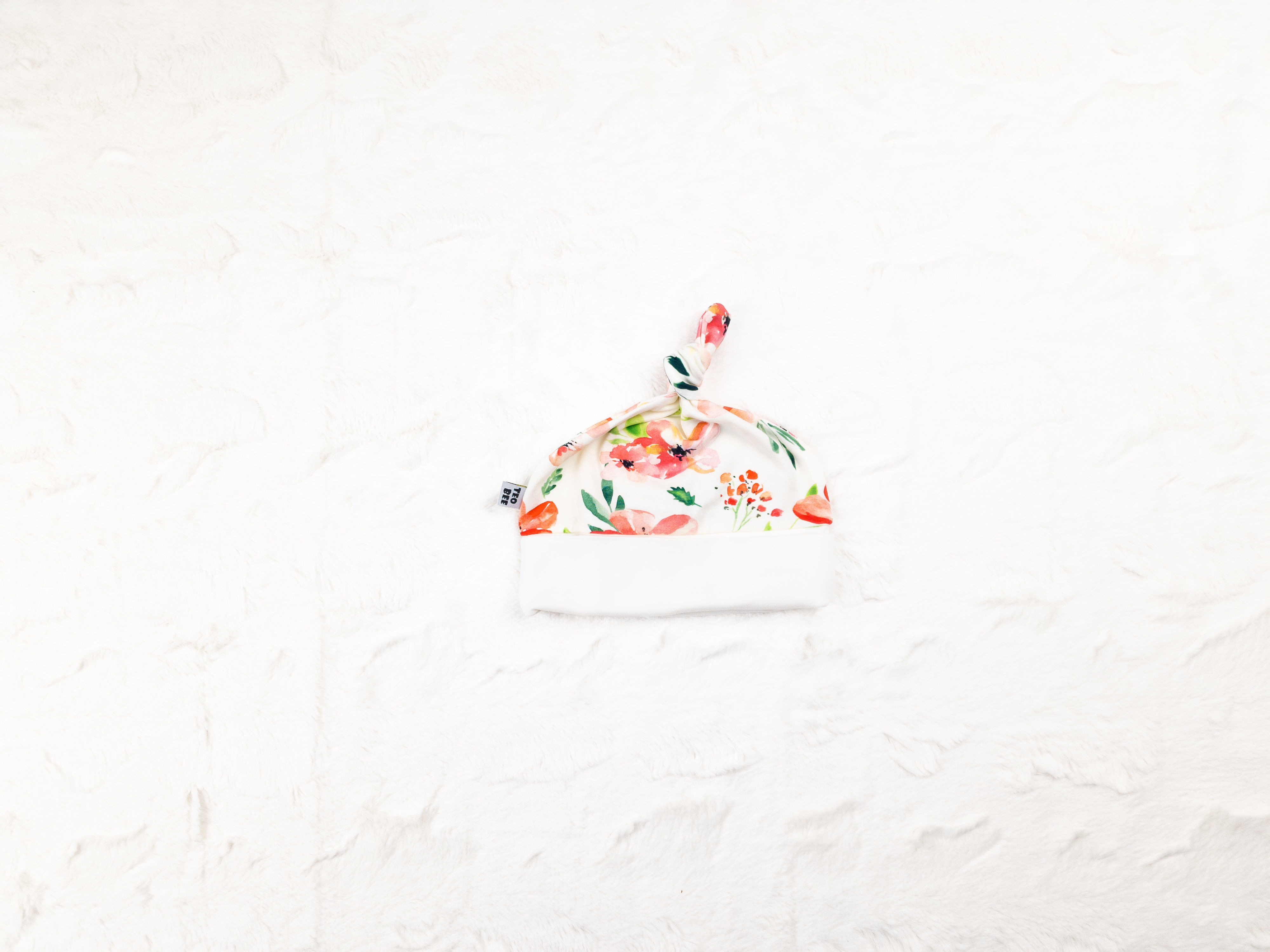 0-3 mēneši Rozā ziedu cepurīte ar mezgliņu