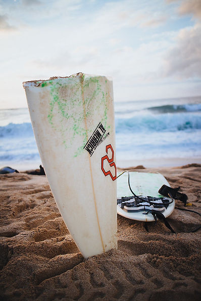 broken-surfboard.jpeg